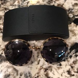 Prada tortoise sunglasses.